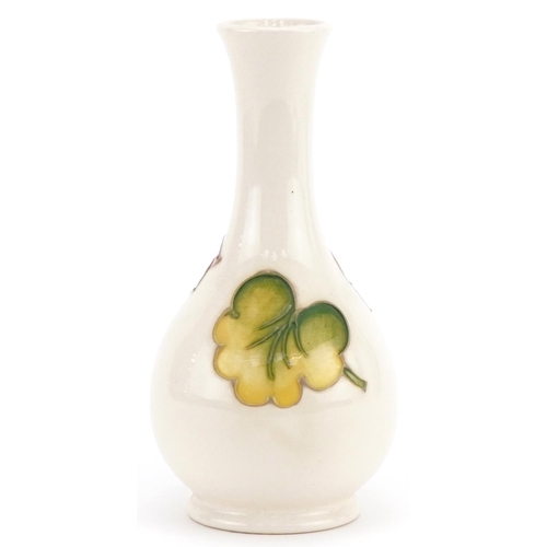 365A - Moorcroft Geranium pattern vase, 16cm high