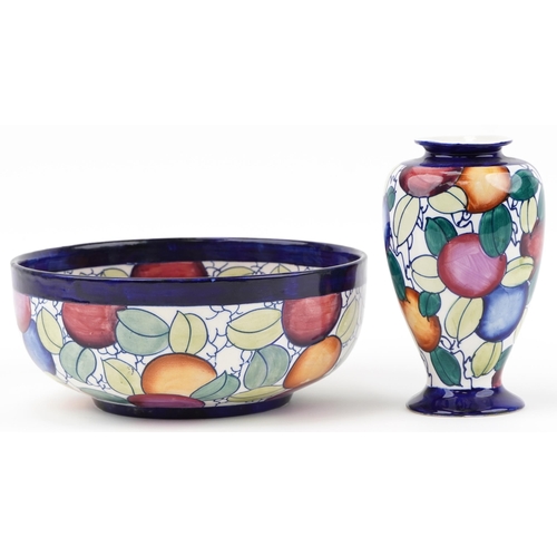 220 - Charlotte Rhead for Bursley Ware bowl and vase hand painted with fruit numbered 936 to the base, the... 