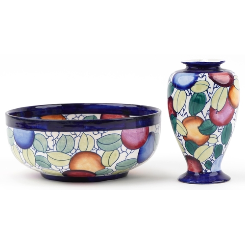 220 - Charlotte Rhead for Bursley Ware bowl and vase hand painted with fruit numbered 936 to the base, the... 