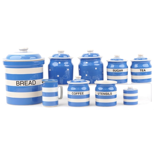 2141 - T G Green Cloverleaf Cornishware storage jars and a vintage milk jug including a bread bin, the larg... 