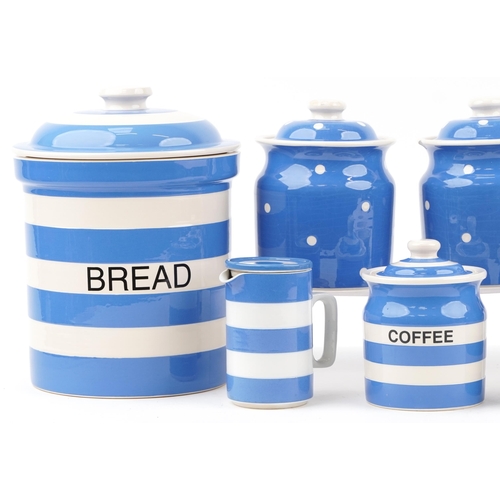 2141 - T G Green Cloverleaf Cornishware storage jars and a vintage milk jug including a bread bin, the larg... 