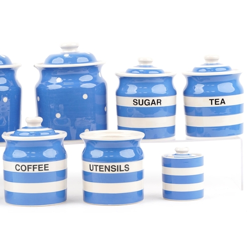 2141 - T G Green Cloverleaf Cornishware storage jars and a vintage milk jug including a bread bin, the larg... 