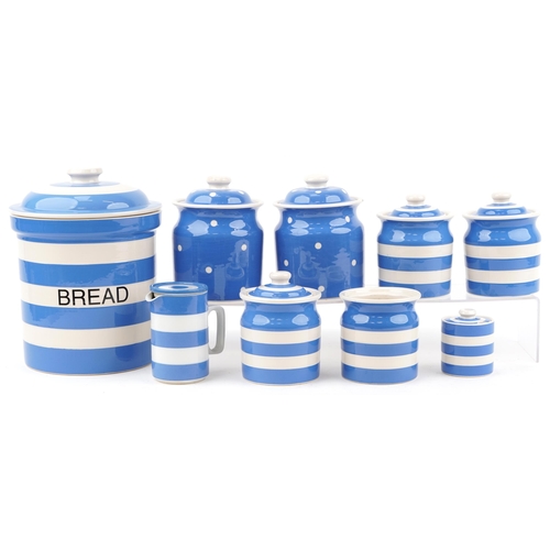 2141 - T G Green Cloverleaf Cornishware storage jars and a vintage milk jug including a bread bin, the larg... 