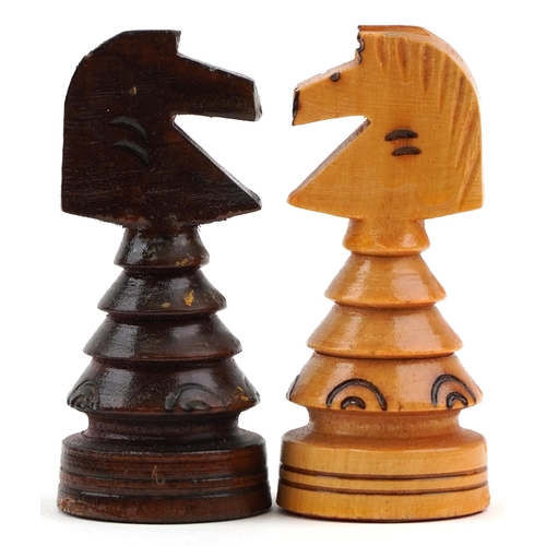 2325 - Drzewiarz carved wooden chess set and folding board, the largest piece 9.5cm high, the board 44.5cm ... 