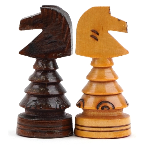 2325 - Drzewiarz carved wooden chess set and folding board, the largest piece 9.5cm high, the board 44.5cm ... 