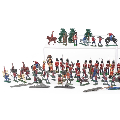 2318 - Large collection of vintage hand painted lead soldiers and boats, the largest 8.5cm in length