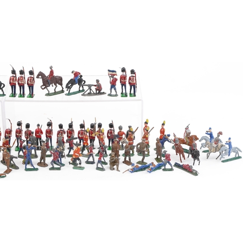 2318 - Large collection of vintage hand painted lead soldiers and boats, the largest 8.5cm in length