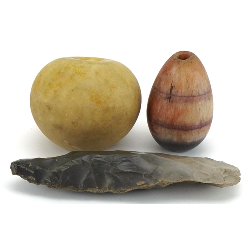 1215 - Blue John paperweight, marble faux apple and a Neolithic flint, the largest 16cm in length