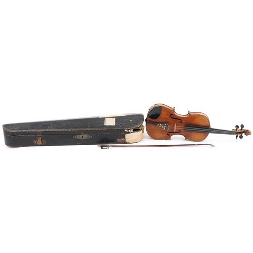 1434 - Old wooden violin with bow and protective carry case, the violin back 14.5 inches in length