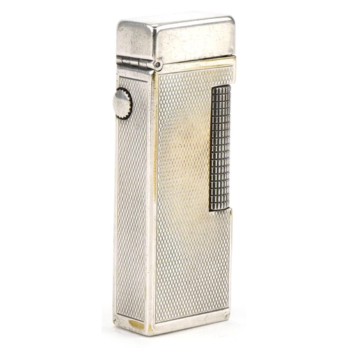 1009 - Dunhill, silver plated pocket lighter with engine turned decoration and case, 6.5cm high