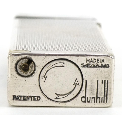 1009 - Dunhill, silver plated pocket lighter with engine turned decoration and case, 6.5cm high