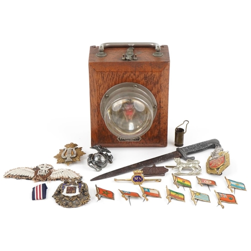 2533 - Militaria including enamel badges, cloth patch, World War II German letter opener and Eveready lamp,... 