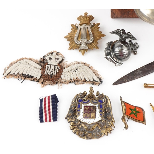 2533 - Militaria including enamel badges, cloth patch, World War II German letter opener and Eveready lamp,... 