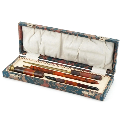 1166 - Johann Faber, vintage Bavarian faux agate desk set including fountain pen, letter seal and letter op... 