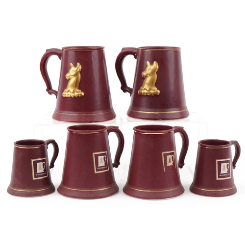 2145 - Six Whitbread burgundy glazed tankards, some by Bretby and Harry E Tunnicliffe Ltd, the largest 19cm... 