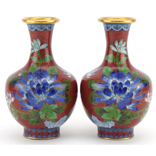 1071 - Pair of Chinese cloisonné vases enamelled with birds and flowers, 15.5cm high