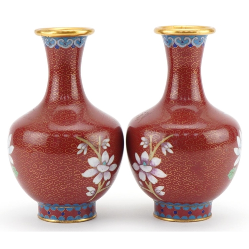 1071 - Pair of Chinese cloisonné vases enamelled with birds and flowers, 15.5cm high