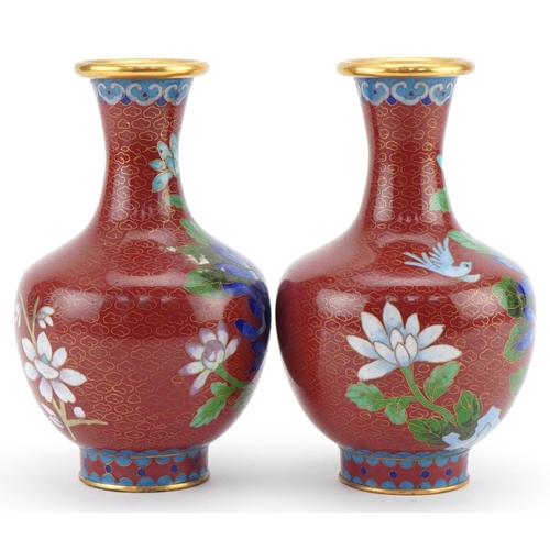 1071 - Pair of Chinese cloisonné vases enamelled with birds and flowers, 15.5cm high