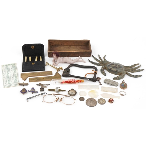 2204 - Sundry items including a bisque nude bather, bronze crab, silver and enamel military interest cap ba... 