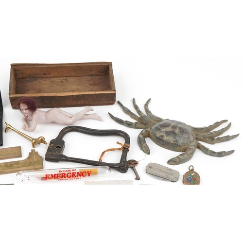 2204 - Sundry items including a bisque nude bather, bronze crab, silver and enamel military interest cap ba... 