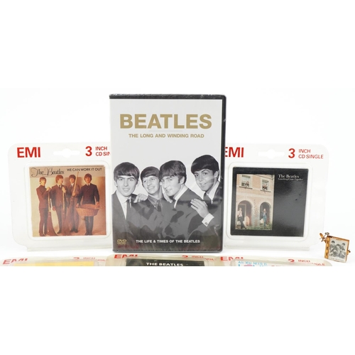 1455 - Beatles memorabilia including vintage folding photo album keyring and 3 inch CD singles