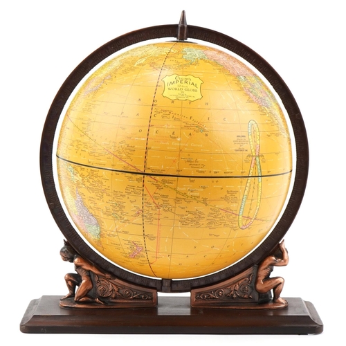 2168 - Vintage Crams Imperial twelve inch world globe with atlas design stand