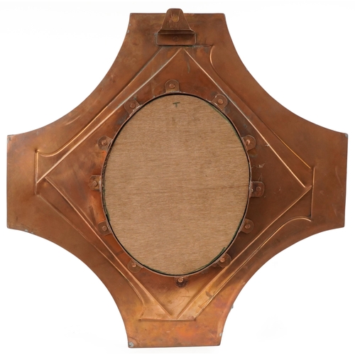 402 - Sam Fanaroff stylized copper mirror inset with red stone cabochons, 68cm x 67cm