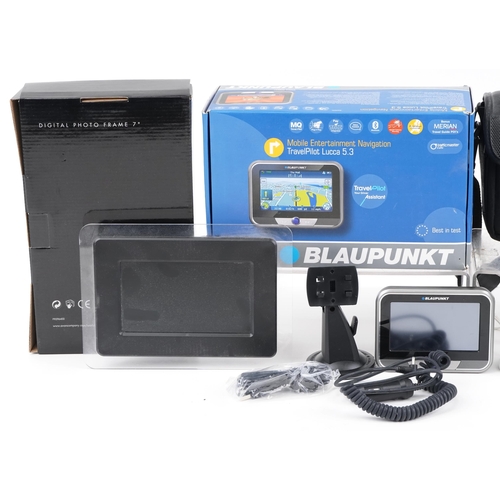 1553 - Electricals including Fujifilm F401 digital camera, Blaupunkt navigation system and a digital photo ... 