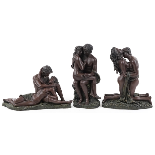 2110 - Three bronzed erotic figure groups of lovers, the largest 28cm high