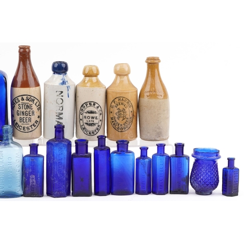 1374 - Collection of antique and later glass and stoneware bottles, some advertising, including Bristol Blu... 