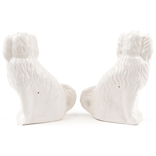 2187 - Pair of Staffordshire style seated Spaniels, 29cm high