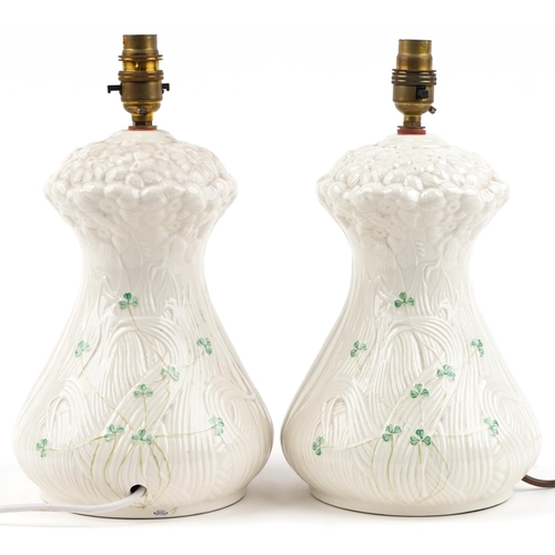 2117 - Pair of Belleek Irish porcelain table lamps, each overall 34cm high