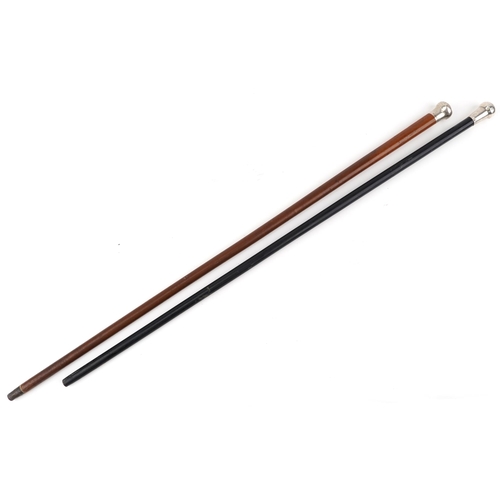 1037 - Two silver handled walking sticks, one malacca and one ebony, the largest 91cm in length