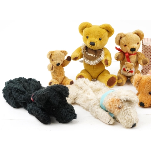 2350 - Four vintage Merrythought pyjama cases in the form of dogs and three Merrythought teddy bears, the l... 