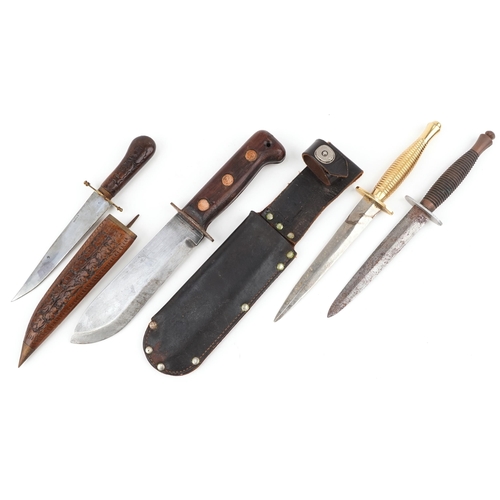 2608 - Four edged weapons including two Fairbairn style fighting knives, the largest 32cm in length