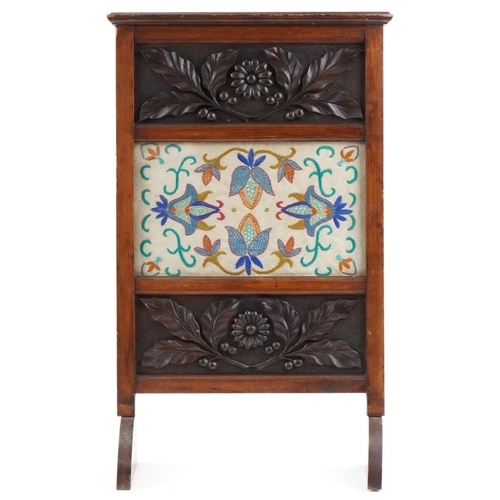 170 - Arts & Crafts carved oak and tapestry fire screen carved with flowers, 80cm x 50cm