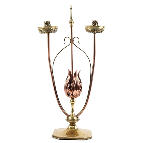 44 - Arts & Crafts copper and brass W.A.S Benson tulip design floor standing twin candlestick, 70cm high