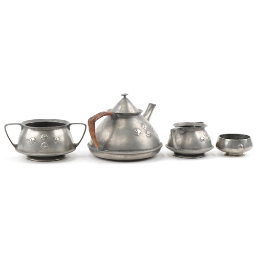 53 - Archibald Knox for Liberty's Tudric pewter tea set, numbered 0303 to the base, the largest 13cm