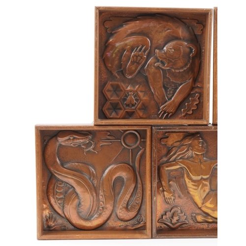 494 - Maredsous Art Deco copper panels mounted in oak frames including bear, tiger, man, wolf and snake, e... 