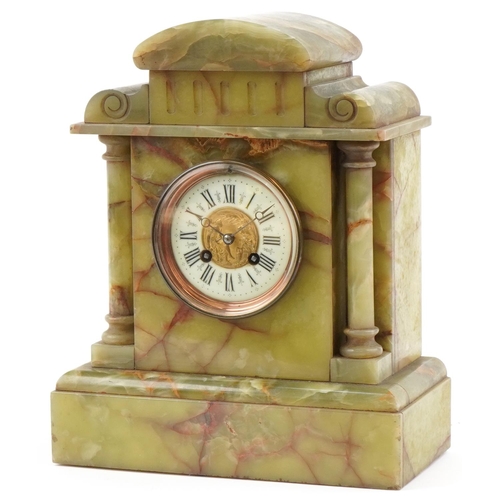 1091 - Green onyx temple mantle clock, the French movement striking on a gong, 34cm high