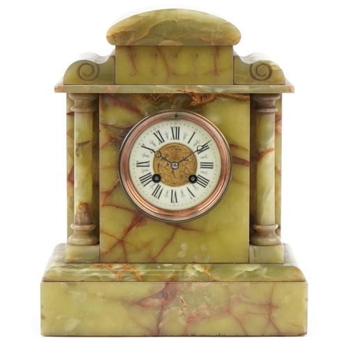 1091 - Green onyx temple mantle clock, the French movement striking on a gong, 34cm high