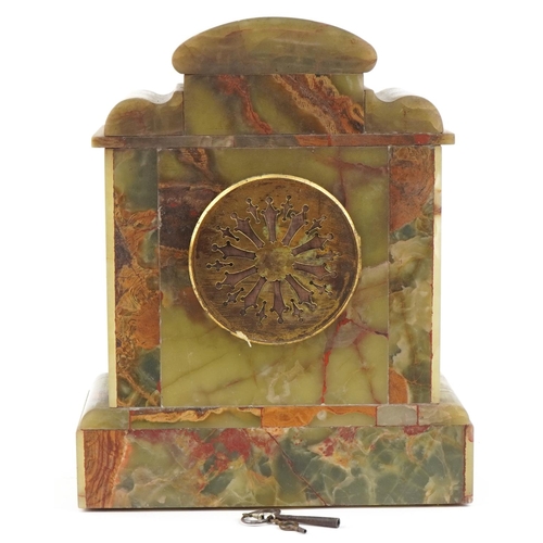 1091 - Green onyx temple mantle clock, the French movement striking on a gong, 34cm high