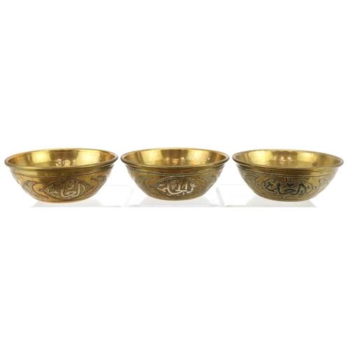 1332 - Six Cairoware brass, copper and silver inlaid bowls, each 12cms in diameter