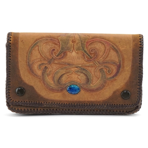 168 - Arts & Crafts leather purse inset with an enamel plaque, initials SE to the reverse, 22cm wide