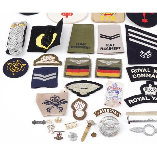 2544 - Military, RAF and naval patches, badges, pips, epaulets together with a Cameron Highlanders cap