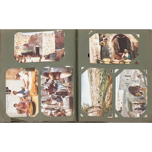 2493 - Album of postcards including Middle Eastern scenes, Tiberias fisherman's boat, The River Jordan, Mou... 