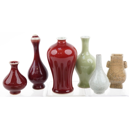 1261 - Eleven Chinese porcelain vases and bowls, some with crackle glaze, the largest 14cm high