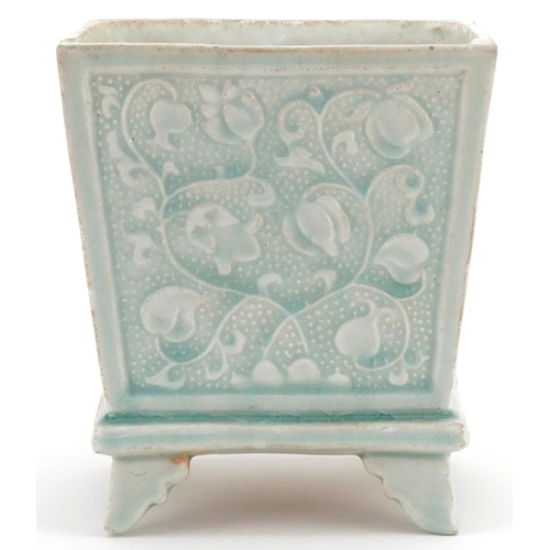 1297 - Chinese porcelain turquoise glazed four footed incense burner decorated with foliage, 16cm high