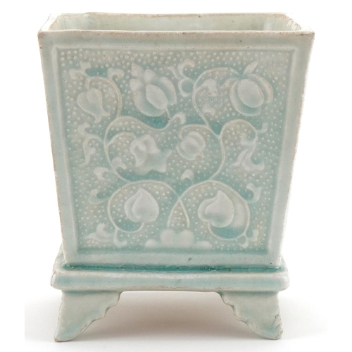 1297 - Chinese porcelain turquoise glazed four footed incense burner decorated with foliage, 16cm high