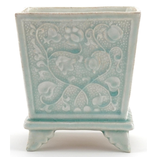 1297 - Chinese porcelain turquoise glazed four footed incense burner decorated with foliage, 16cm high